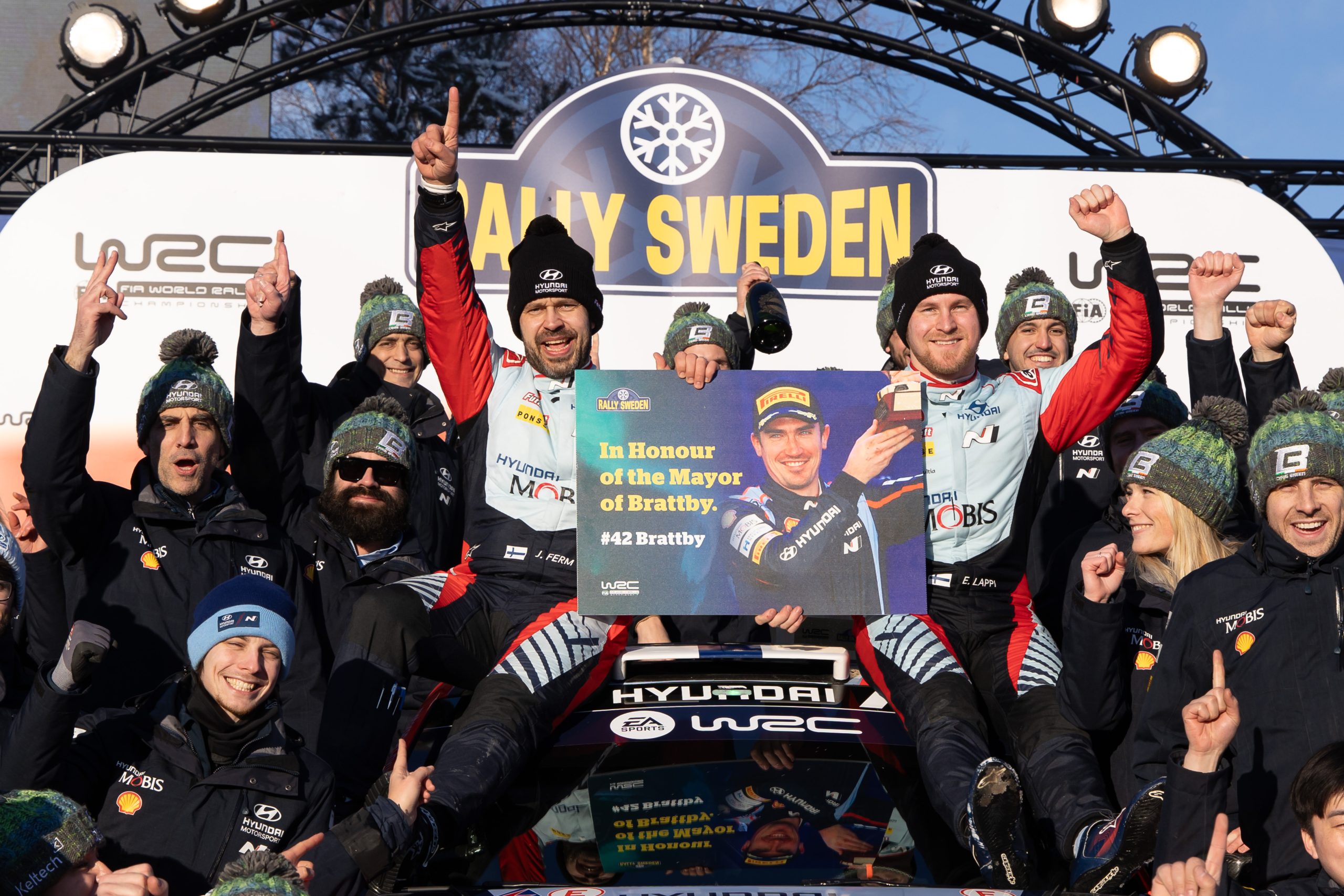 Esapekka Lappi is seen celebrating his Rally Sweden win in honor for Craig Breen